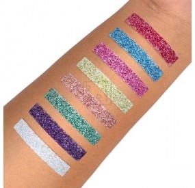 holographic glitter powder on forearm